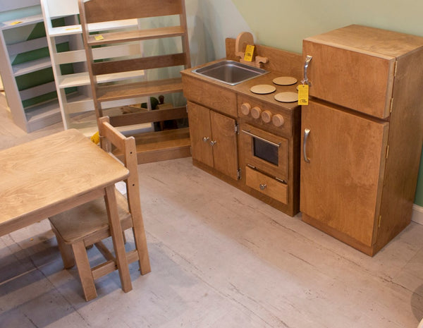 A natural wood furniture set.